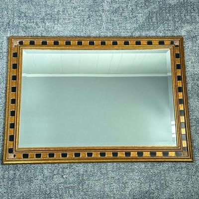 BLACK & BRONZE WOOD FRAME MIRROR | Beveled glass mirror with checkered bronze and black painted pattern around carved wood frame. -...