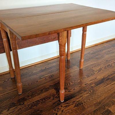 Antique gate leg table with burled walnut tip