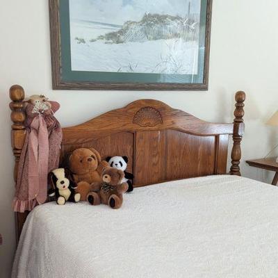 Full size bed with carved headboard