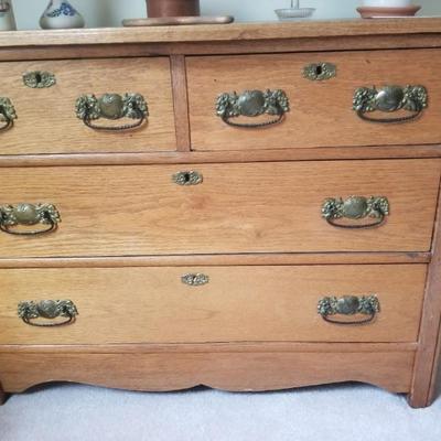 For immediate purchase-Oak 2 over 2 dresser/ 40" w x 18" d x 30" h $125/ Contact Barb to purchase or for more info....
