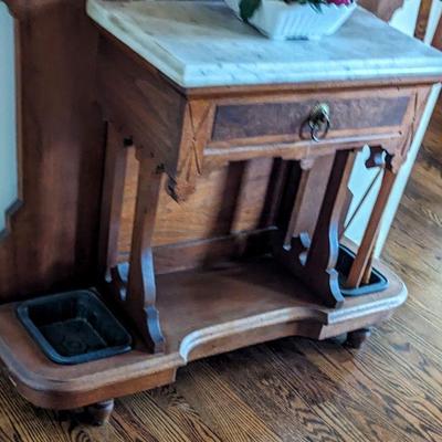 For immediate purchase-Hall tree Walnut with cast iron dishes for canes and umbrellas. 36.5" w x 11" d x 78" H/ $695....