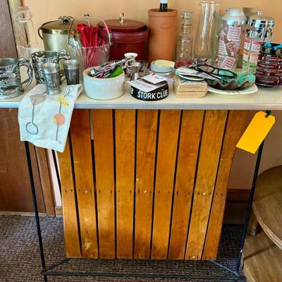 Retro bar and barware. It has 2 shelves inside and is so cool!