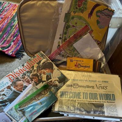 A suitcase filled with vintage Disney parafernalia.