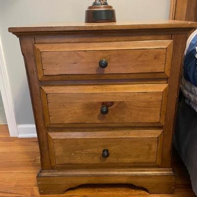 Michael Ashton three drawer nightstand   25” W x 19” D 29.5” H