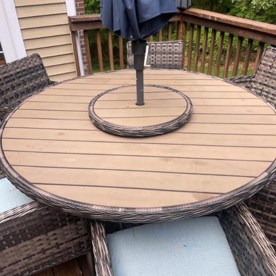 Dine in style with the Lorca dining set, featuring a woven top, and rotating lazy Susan. Crafted from durable wicker with a light tan and...