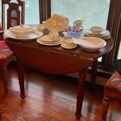 Drop leaf table, gold and white china