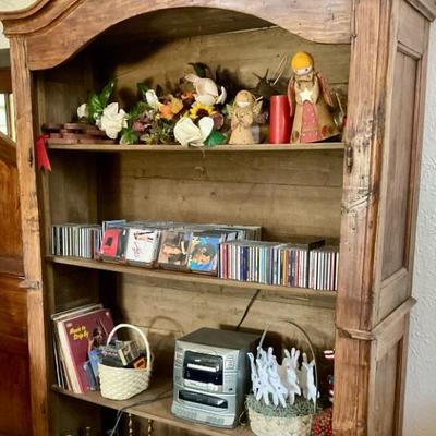 Armoire, stereo system, cds, decorations