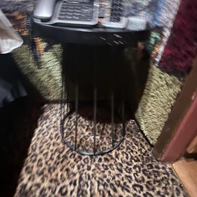 round end table with twisted metal base