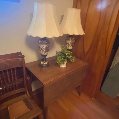 Set of table lamps on drop- leaf table