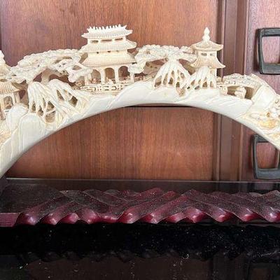 NVN049- Ivory Colored Resin Carving Of Asian Village With Wooden Stand 