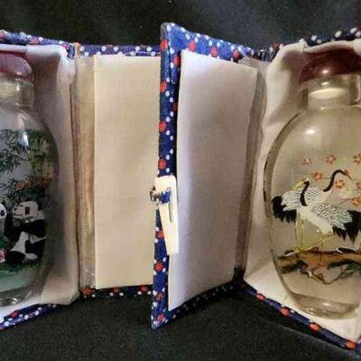NVN110 - Pair of Reverse Painted Snuff Bottles 