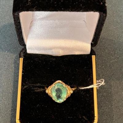 Gold and gemstone. 