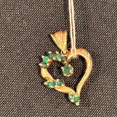 Gold and gemstone. 