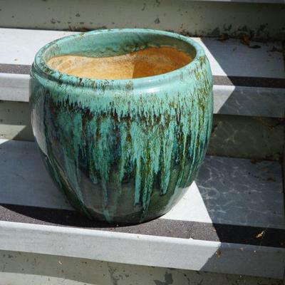 Selection of garden pots of various sizes and style. Some have flowers or plants that are nice. 