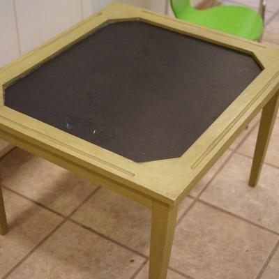 Childs chalk table . there are two sweet plastic chairs also for sale 