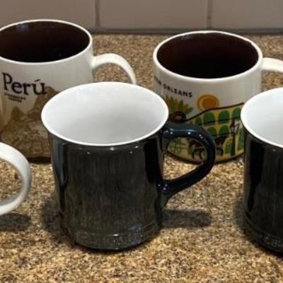(7) Coffee Mugs - (5) Starbucks, (2) Le Creuset 