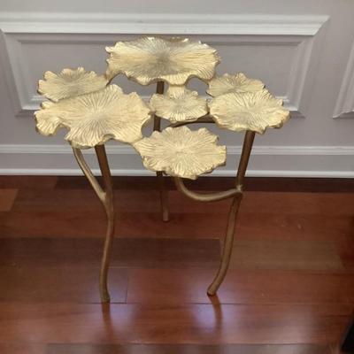 $65-gold leaf table 20"H 19"diameter
