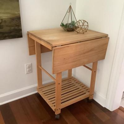$55-island cart, drop leaf, on casters 31'H 24"L 20"depth 37"with leaves up