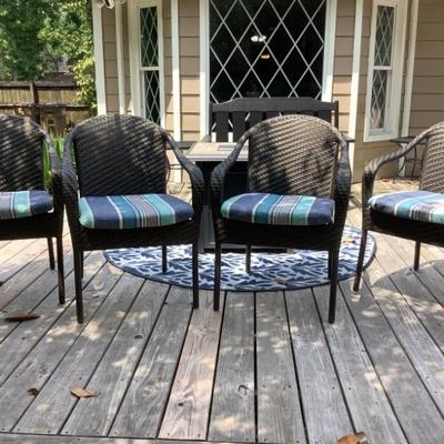$175- 4 outdoor woven chairs AND TABLE !34"H 24"L 21"depth