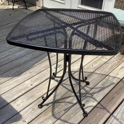 $50- Wrought iron table 29"H 28" x 28

