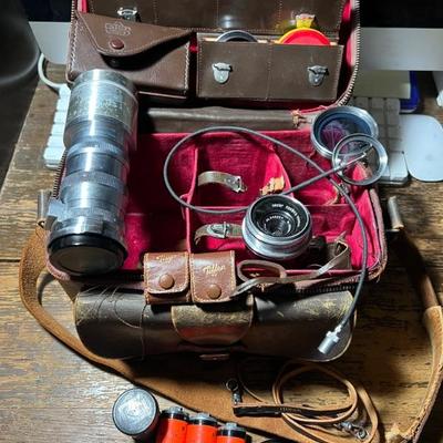Vintage Nikon with case and lenses
