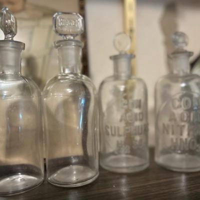 Embossed apothecary jars 