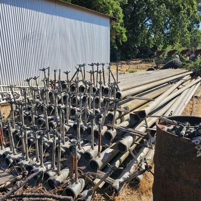 Hand-line irrigation pipe with Spray Gunshttps://levyestateservices.hibid.com/lots