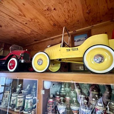 Pedal cars.  There is also a John Deere Pedal tractor