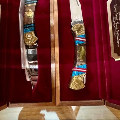 There is are large assortment of buck  custom knives by navajo artist dave yellowhorse