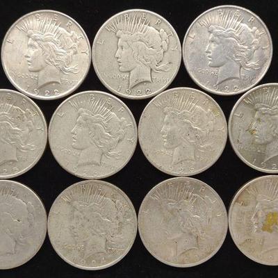 (11) 1922-27 Peace Dollar Coins (incl. 1 "S")