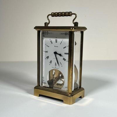 BULOVA 8-DAY BRASS CLOCK | Made in West Germany by Bulova Watch Company, carriage clock with 8-day movement in a beveled glass &...