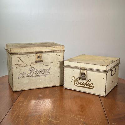 PAIR KREAMER BAKED GOOD TIN BOXES | One labeled "bread", the other labeled "cake", with hinged lids and each marked...