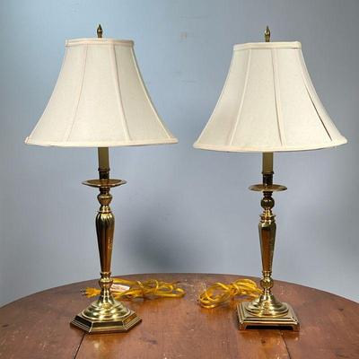 (2PC) BRASS LAMPS | Two similar table lamps having candlestick tops with fluted stems, one with hexagonal base, the other square. - h. 28...