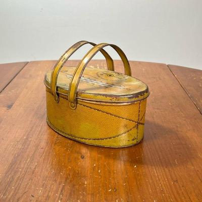 VINTAGE VARSITY TIN LUNCH BOX BY DECOWARE | Football-shaped lunch tin. - l. 8-1/2 x w. 6 x h. 6-1/2 in

