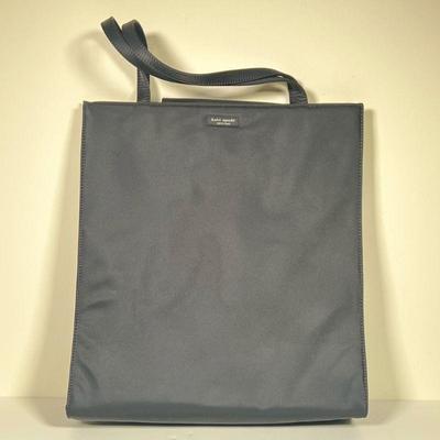 KATE SPADE HANDBAG | Black handbag by Kate Spade with polka-dot interior. - l. 13.5 x w. 4 x h. 16 in

