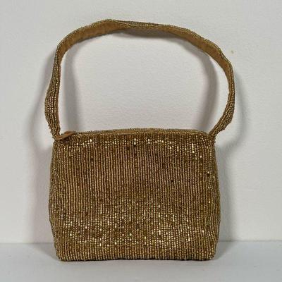 LA REGALE GOLD MINI FORMAL HANDPURSE | Gold beaded La Regale gold evening purse, in good condition. - l. 6 x w. 4-1/2 x h. 5 in

