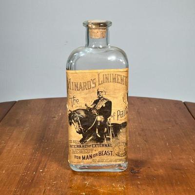 MINARD’S LINIMENT REMEDY BOTTLE | Apothecary bottle with old paper label mostly intact and in good condition; "the great internal...