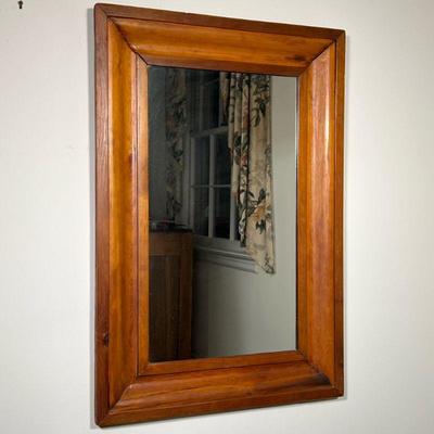 WOOD FRAMED MIRROR | Large mirror in a carved wood frame. - l. 35 x w. 24 in


