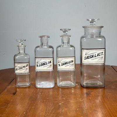 (4PC) RECESSED LABEL APOTHECARY JARS | Of graduated heights. - h. 9.5 in (tallest)

