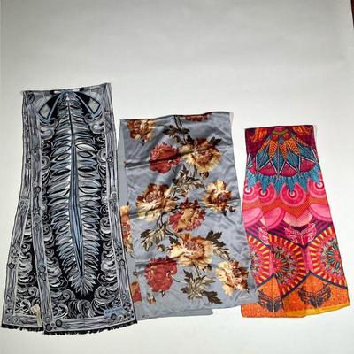 THREE LONG SCARVES | Three scarves in great condition. One scarf is by Warriors in Pink by Ford, bright and colorful Arabesque patterns....