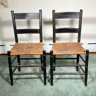 PAIR VINTAGE WOOD PAINTED CHAIRS | 2 hand-painted ladderback wood side chairs with woven seats. - l. 16-1/4 x w. 15-1/2 x h. 31 in

