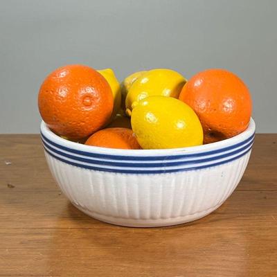FRUIT BOWL WITH WOODEN FRUIT | Bowl full of wooden lemons and oranges. - l. 9 x w. 9 x h. 3-1/2 in

