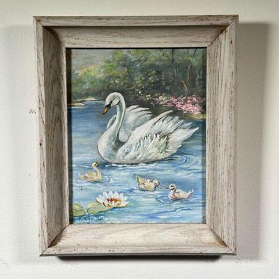 F. WOOLLEY OIL PAINTING | Showing a mother swan, oil on board in a white-washed wooden frame, signed lower left (board 10 x 8 in.) - l....