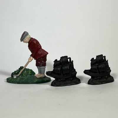 (3PC) BOOKENDS & DOOR STOP | Including a pair of ship-form bookends and a doorstop in the form of a man playing golf. - l. 7 x w. 2 x...