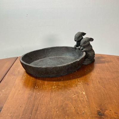 CARVED COMPOSITE BUNNY BOWL | Black composition bowl with two rabbits on the rim. - l. 12 x w. 8-1/2 x h. 5 in

