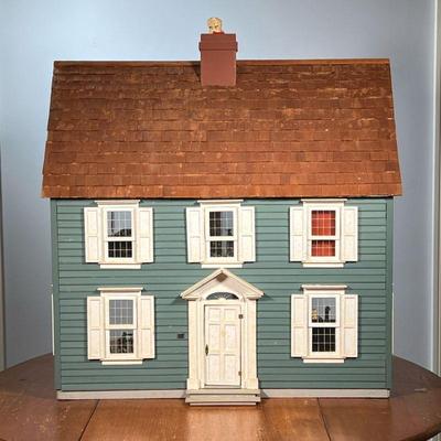 LARGE DOLL HOUSE | Large three-story wooden doll house filled with dollhouse miniature furniture and accessories, including a miniature...