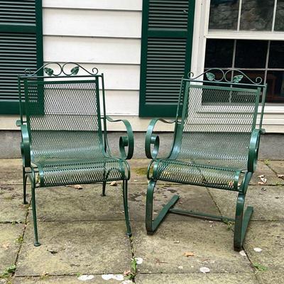 (2PC) OUTDOOR IRON CHAIRS | Having grate seat & back with curved wrought iron arms and curved legs, including one armchair and a...