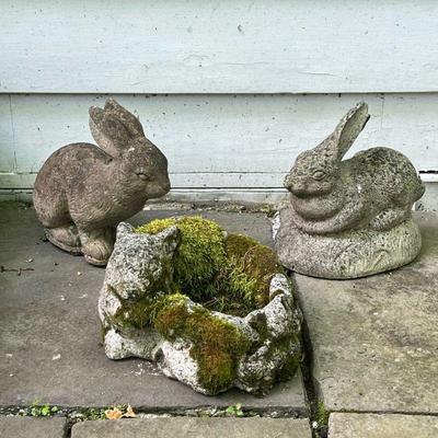 (3PC) CONCRETE GARDEN RABBITS | Concrete garden statues in the form of rabbits, including a standing rabbit, a seated bunny, a small...