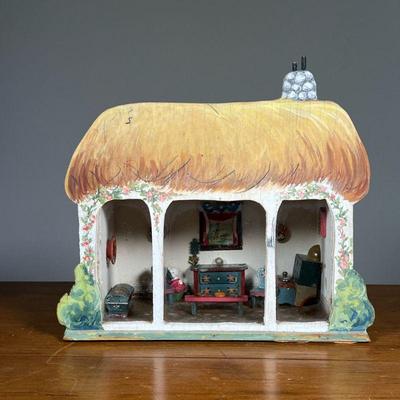 MINIATURE WOODEN DIORAMA | Painted wood home with glass covering, hand painted and decorated with miniature cottage furniture, signed on...