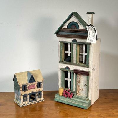 (2PC) TWO-HAND CRAFTED HOUSES | Hand-crafted and hand-painted decorative houses, including a small two-story cottage, and a two-story...